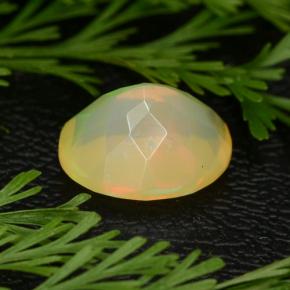 1.69캐럿 천연 옐로우 오팔, 타원형 컷, 9.9×7.8 mm, 투명한