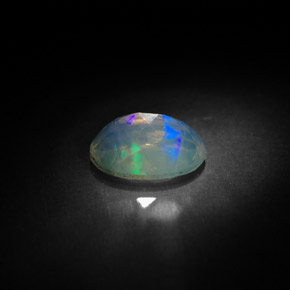 0.83캐럿 천연 멀티컬러 오팔, 투명한, 8.2×6.1 mm, 투명/반투명