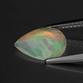 1.01캐럿 천연 멀티컬러 오팔, 배 모양, 10.7×7.3 mm, 투명한