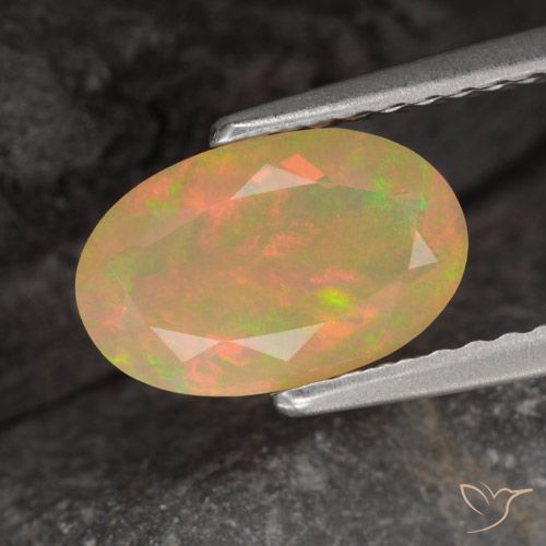 0.86ct 자연스러운 다색 오팔, 타원형, 투명한
