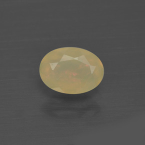 0.48캐럿 천연 멀티컬러 오팔, 타원형 컷, 7.1×5.1 mm, 투명한