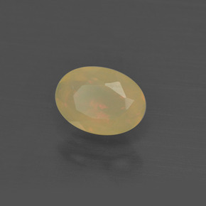 0.48캐럿 천연 멀티컬러 오팔, 타원형 컷, 7.1×5.1 mm, 투명한