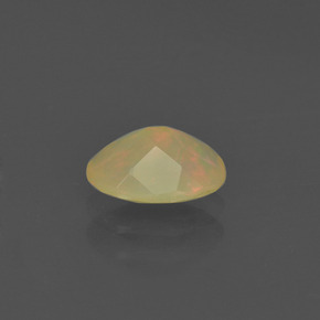 0.48캐럿 천연 멀티컬러 오팔, 타원형 컷, 7.1×5.1 mm, 투명한