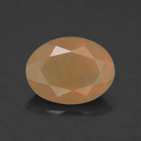 0.69캐럿 천연 멀티컬러 오팔, 타원형 컷, 8.2×6.2 mm, 투명한