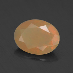 0.69캐럿 천연 멀티컬러 오팔, 타원형 컷, 8.2×6.2 mm, 투명한