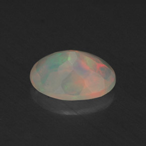 0.64캐럿 천연 멀티컬러 오팔, 투명한, 7.7×5.8 mm, 투명/반투명