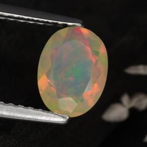 0.67캐럿 천연 옐로우 오팔, 타원형 컷, 8×6 mm, 투명한