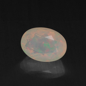 0.87캐럿 천연 멀티컬러 오팔, 투명한, 8×5.8 mm, 투명/반투명