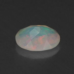 0.67캐럿 천연 멀티컬러 오팔, 투명한, 7.9×6 mm, 투명/반투명