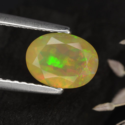 0.70캐럿 천연 멀티컬러 오팔, 타원형 컷, 7.8×5.9 mm, 투명한