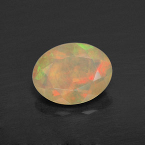 0.72캐럿 천연 멀티컬러 오팔, 투명한, 7.9×6.1 mm, 투명/반투명