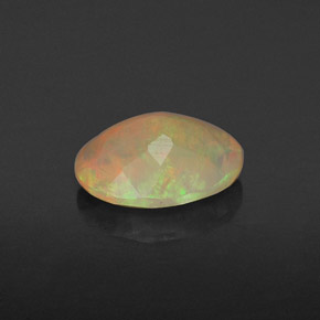0.72캐럿 천연 멀티컬러 오팔, 투명한, 7.9×6.1 mm, 투명/반투명