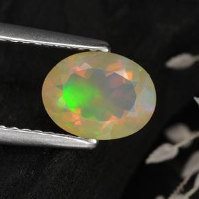 0.75캐럿 천연 멀티컬러 오팔, 타원형 컷, 8.1×6.3 mm, 투명한