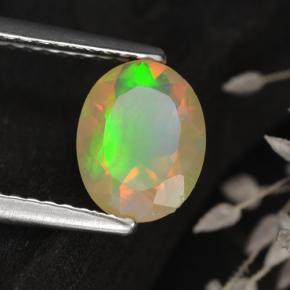 0.75캐럿 천연 멀티컬러 오팔, 타원형 컷, 8.1×6.3 mm, 투명한