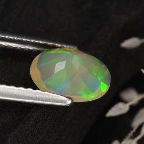 0.75캐럿 천연 멀티컬러 오팔, 타원형 컷, 8.1×6.3 mm, 투명한