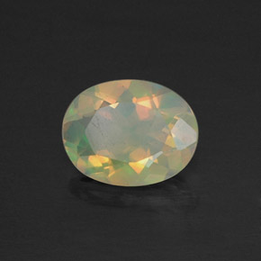 0.73캐럿 천연 멀티컬러 오팔, 타원형 컷, 7.8×6 mm, 투명한