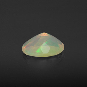 0.73캐럿 천연 멀티컬러 오팔, 타원형 컷, 7.8×6 mm, 투명한