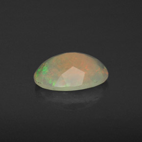 0.78캐럿 천연 멀티컬러 오팔, 투명한, 8.4×6.3 mm, 투명/반투명