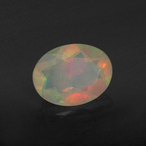 0.74캐럿 천연 멀티컬러 오팔, 타원형 컷, 8.2×6.2 mm, 투명한