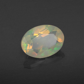 0.67캐럿 천연 멀티컬러 오팔, 투명한, 7.8×5.7 mm, 투명/반투명
