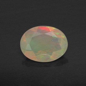 0.69캐럿 천연 멀티컬러 오팔, 투명한, 8.1×6.3 mm, 투명/반투명