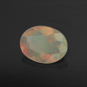 0.69캐럿 천연 멀티컬러 오팔, 투명한, 8.1×6.3 mm, 투명/반투명