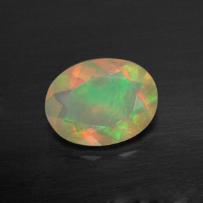 0.73캐럿 천연 멀티컬러 오팔, 투명한, 8.1×6.1 mm, 투명/반투명