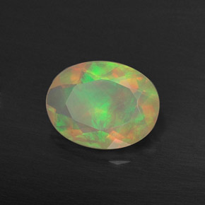 0.73캐럿 천연 멀티컬러 오팔, 투명한, 8.1×6.1 mm, 투명/반투명