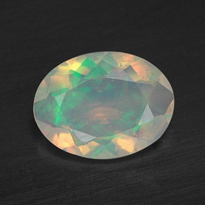 0.59캐럿 천연 멀티컬러 오팔, 투명한, 8×6.1 mm, 투명/반투명