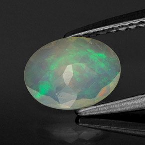 0.59캐럿 천연 멀티컬러 오팔, 투명한, 8×6.1 mm, 투명/반투명