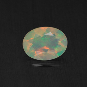 0.65캐럿 천연 멀티컬러 오팔, 투명한, 7.8×5.8 mm, 투명/반투명
