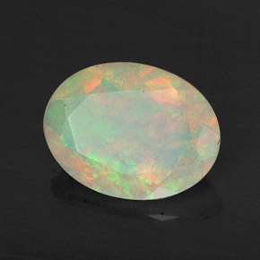 0.67캐럿 천연 멀티컬러 오팔, 투명한, 8.1×6.1 mm, 투명/반투명