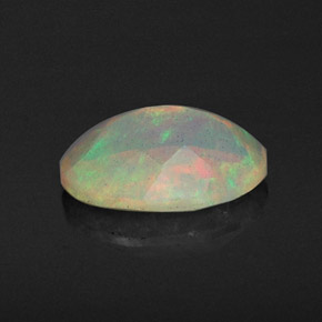 0.67캐럿 천연 멀티컬러 오팔, 투명한, 8.1×6.1 mm, 투명/반투명