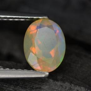 0.88캐럿 천연 멀티컬러 오팔, 타원형 컷, 8.1×6.1 mm, 투명한