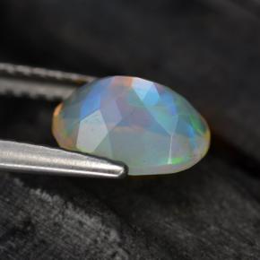 0.88캐럿 천연 멀티컬러 오팔, 타원형 컷, 8.1×6.1 mm, 투명한