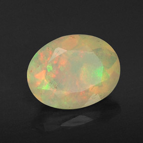 0.80캐럿 천연 멀티컬러 오팔, 타원형 컷, 8×6.2 mm, 투명한