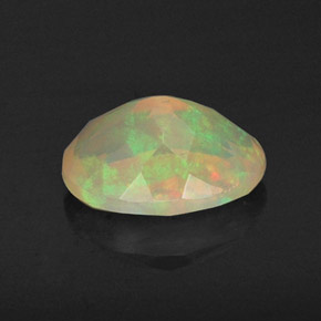 0.80캐럿 천연 멀티컬러 오팔, 타원형 컷, 8×6.2 mm, 투명한