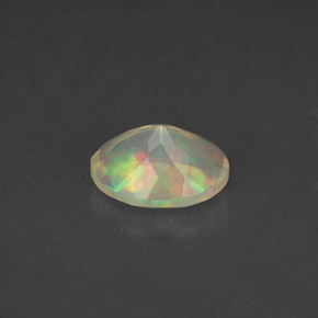0.77캐럿 천연 멀티컬러 오팔, 타원형 컷, 8×6.2 mm, 투명한
