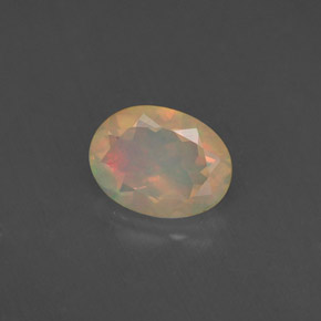 0.75캐럿 천연 멀티컬러 오팔, 투명한, 8.1×6.1 mm, 투명/반투명