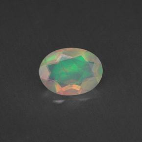 0.65캐럿 천연 멀티컬러 오팔, 투명한, 8.2×6.1 mm, 투명/반투명