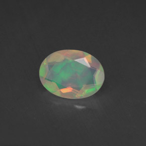 0.65캐럿 천연 멀티컬러 오팔, 투명한, 8.2×6.1 mm, 투명/반투명