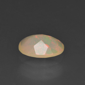 0.78캐럿 천연 멀티컬러 오팔, 타원형 컷, 8.4×6.2 mm, 투명한