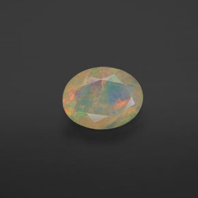 0.63캐럿 천연 멀티컬러 오팔, 투명한, 8×6.2 mm, 투명/반투명
