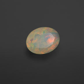 0.63캐럿 천연 멀티컬러 오팔, 투명한, 8×6.2 mm, 투명/반투명