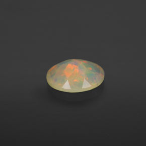 0.63캐럿 천연 멀티컬러 오팔, 투명한, 8×6.2 mm, 투명/반투명
