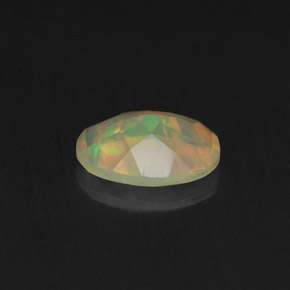 0.62캐럿 천연 멀티컬러 오팔, 투명한, 7.9×5.9 mm, 투명/반투명