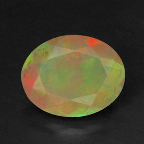 1.09캐럿 천연 멀티컬러 오팔, 타원형 컷, 9×7.1 mm, 투명한