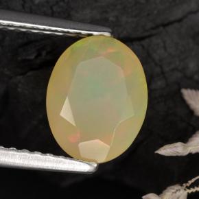 1.04캐럿 천연 멀티컬러 오팔, 타원형 컷, 9.1×7 mm, 투명한