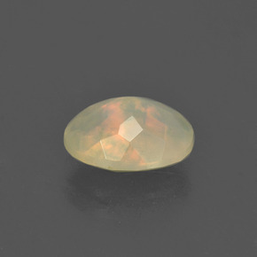 1.20캐럿 천연 멀티컬러 오팔, 타원형 컷, 9.1×7.1 mm, 투명한