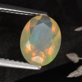 1.05캐럿 천연 멀티컬러 오팔, 타원형 컷, 9.1×7.1 mm, 투명한